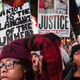People protest in Times Square Nov. 25, 2014, in New York City over the grand jury decision not to indict then-Officer Darren Wilson in the Michael Brown case in Ferguson, Mo.
Andrew Burton/Getty Images